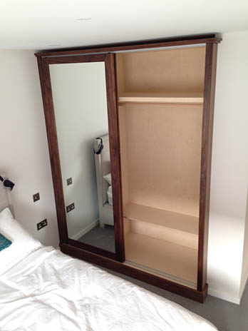 Fitted mirrored wardrobe interior rails and shelving, handmade in Shropshire